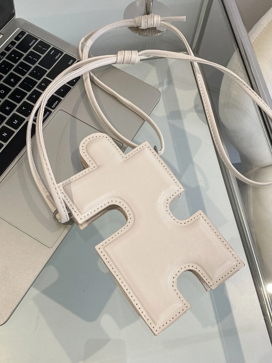 Missing Piece Phone Bag White